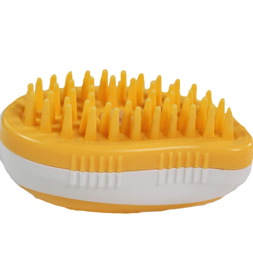 Yellow grooming brush with textured surface on a white background