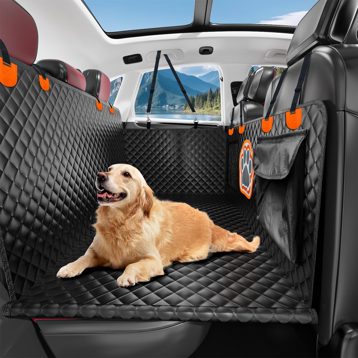 Dog lying on a black car bench cover with orange accents, inside a vehicle with a scenic view outside.