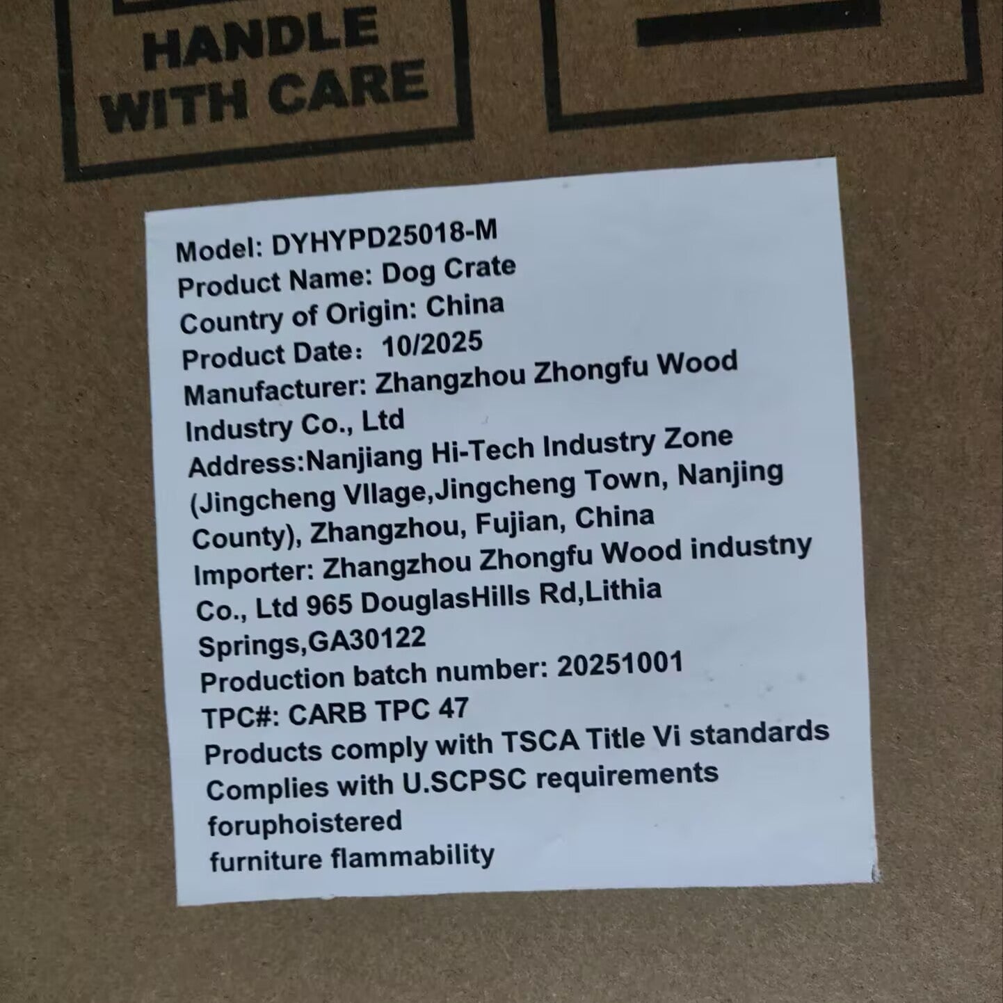 Product label on a cardboard surface with text detailing model, product name, and specifications.