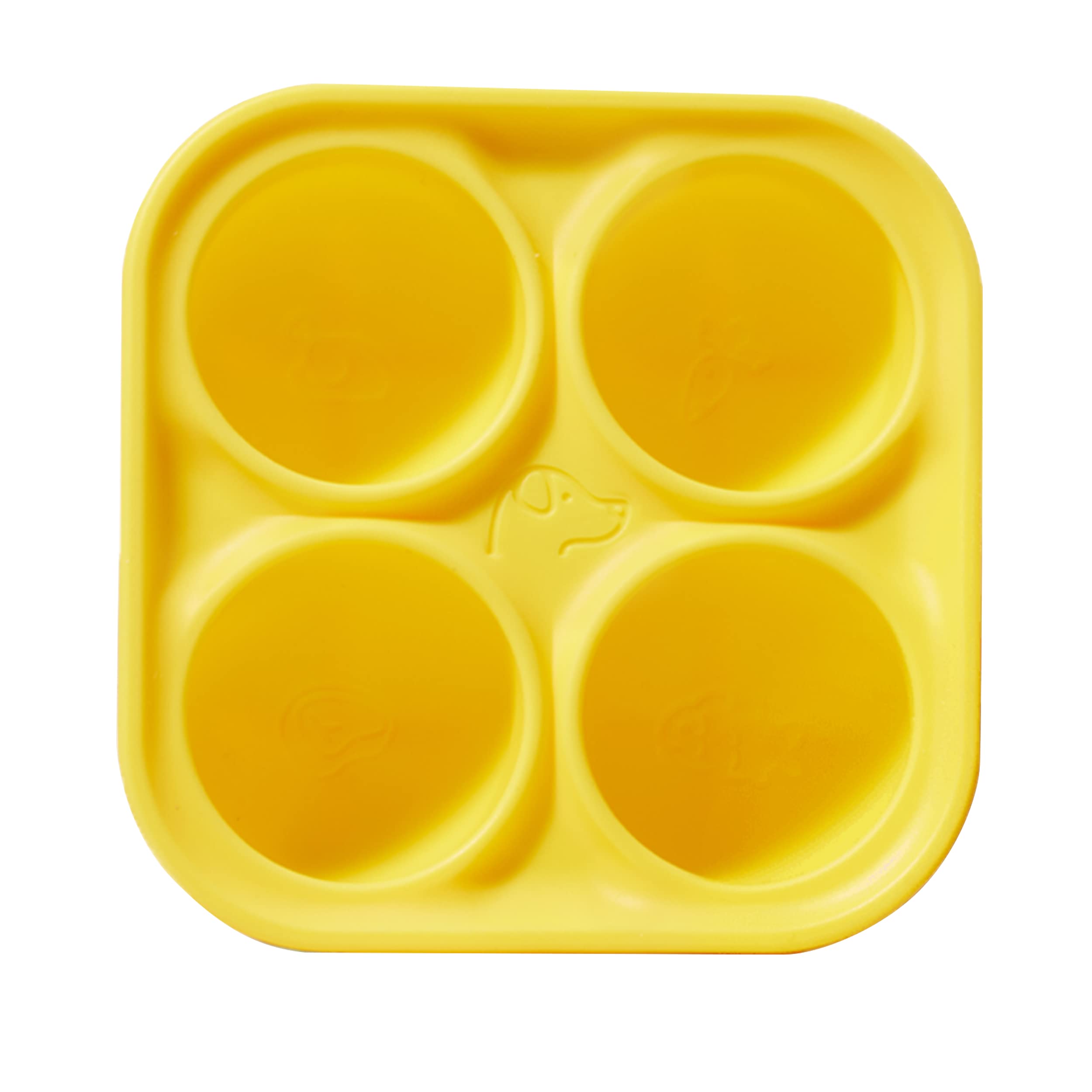 Yellow silicone mold with four circular compartments on a white background