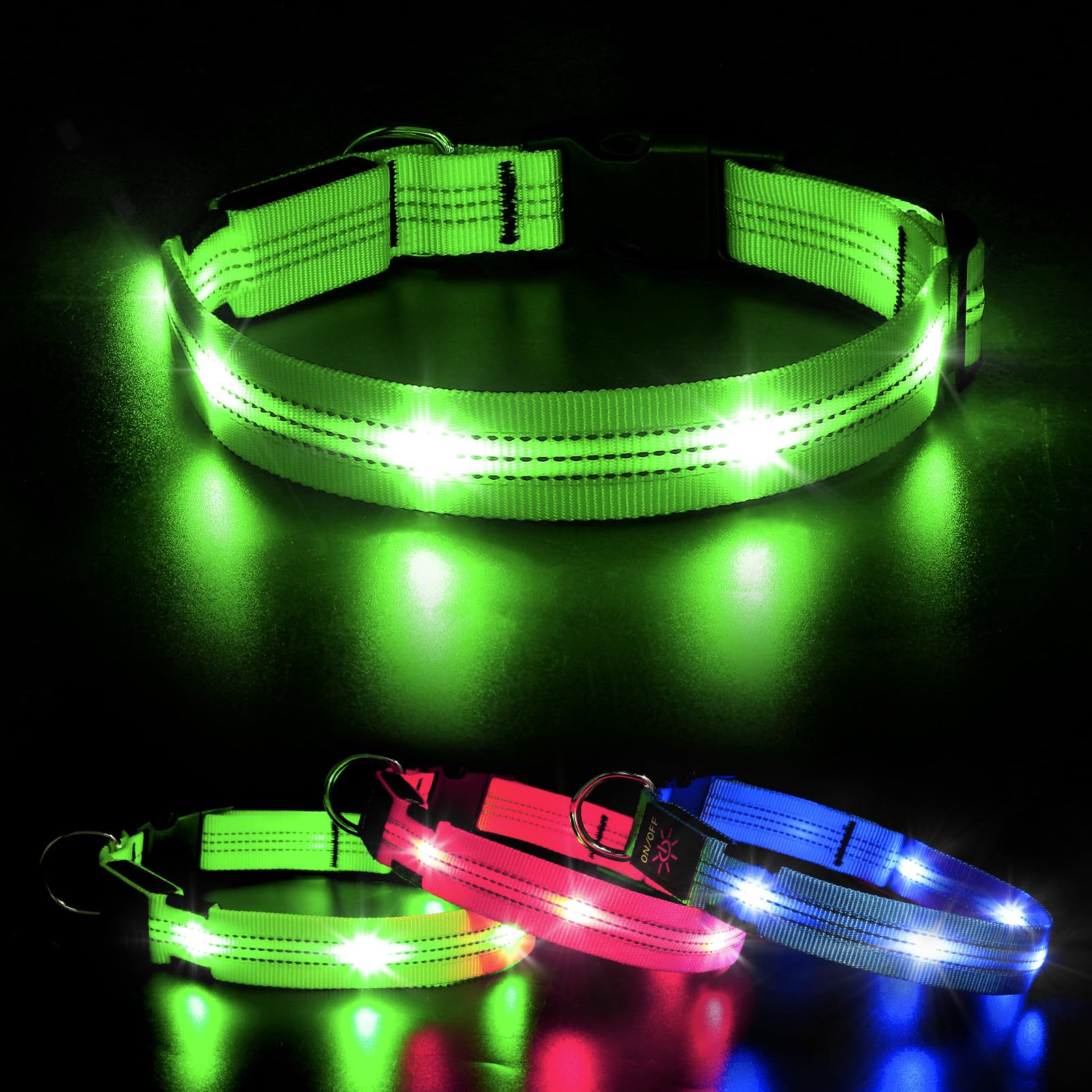 Green LED dog collar glowing on a dark background with additional collars in pink and blue below.