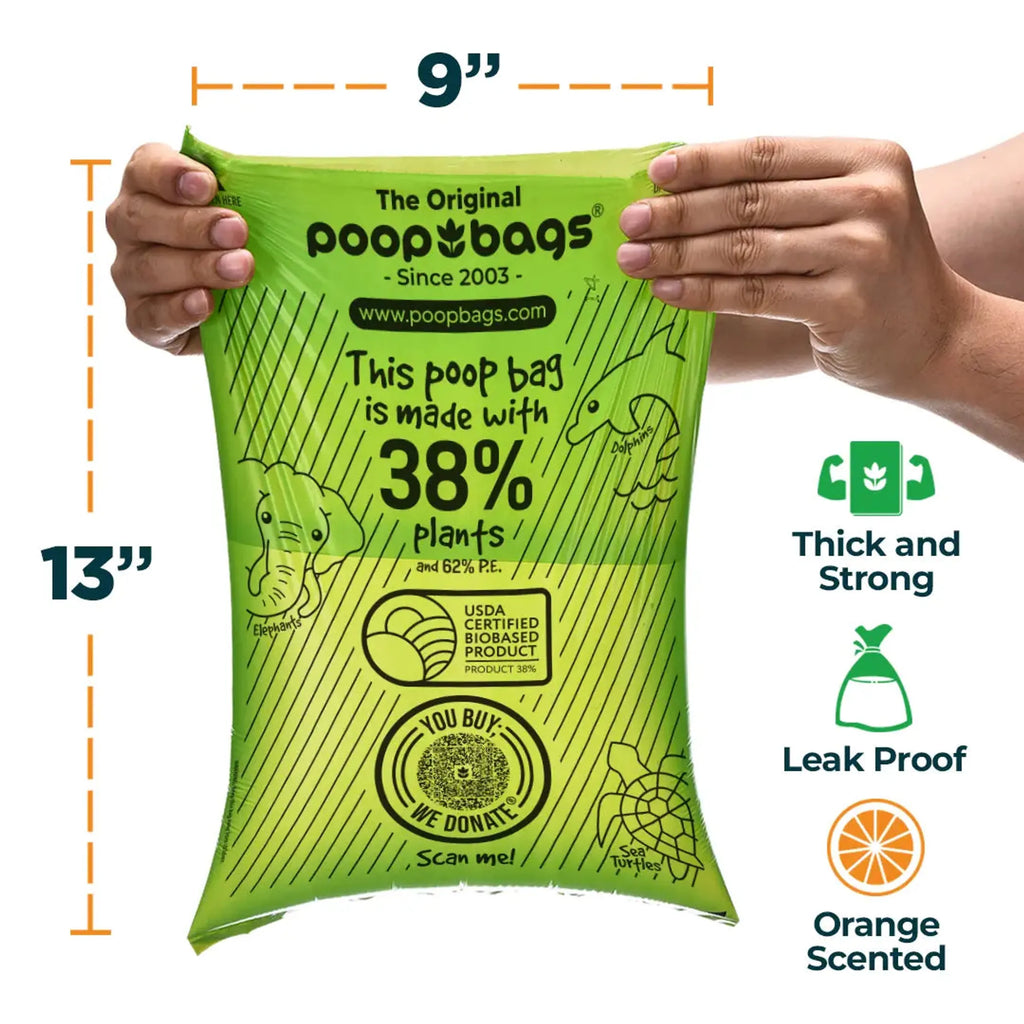 Green poop bag package held by hands with product features highlighted