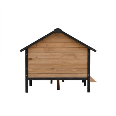 Wooden pet house with a black roof on a white background