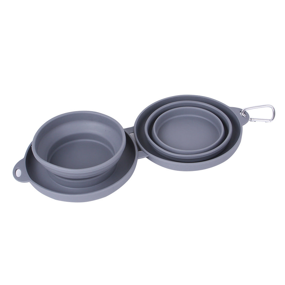 Set of three gray collapsible bowls on a white background