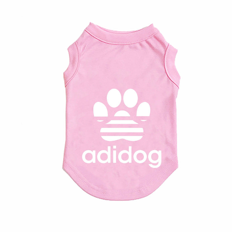 pink pet shirt with white paw print and 'adidog' text on a white background