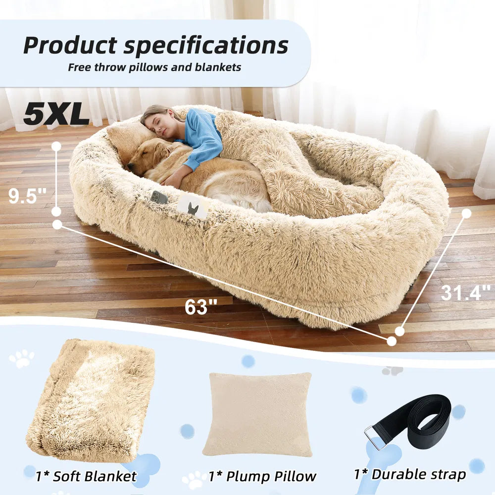 Large pet bed with dimensions and accessories on a wooden floor.