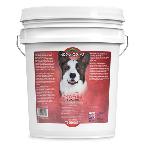 White bucket of Bio-Groom Flea & Tick Shampoo with a dog on the label against a white background