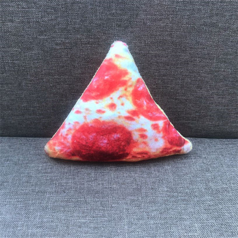 Triangular pillow with a red and white pattern on a gray background