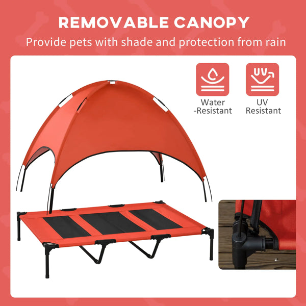 Red pet cot with removable canopy on a white background