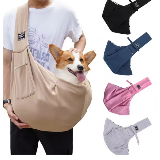 Dog in a beige sling carrier with additional slings in different colors on a white background