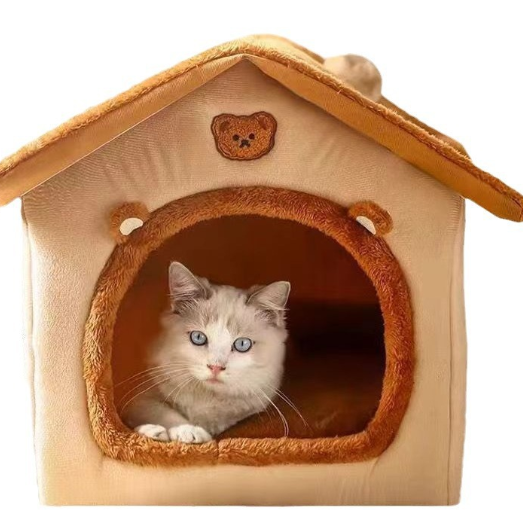 Cat peeking out from a cozy beige pet house with brown accents on a white background