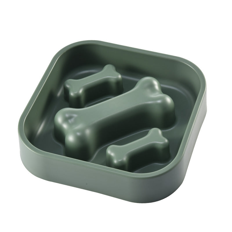 Green pet food bowl with bone-shaped compartments on a white background
