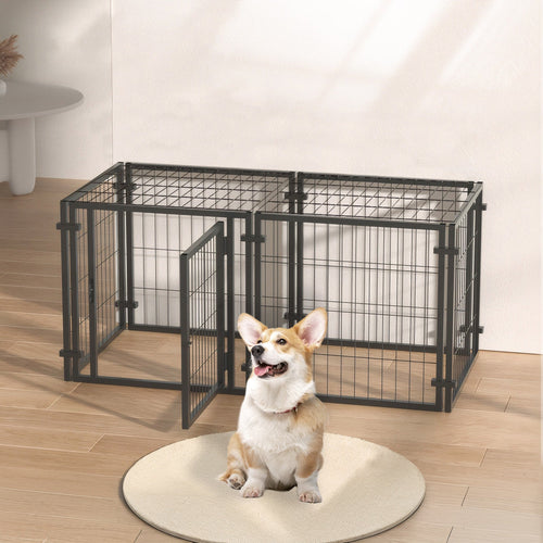 Dog standing inside a large black metal pet playpen on a wooden floor.