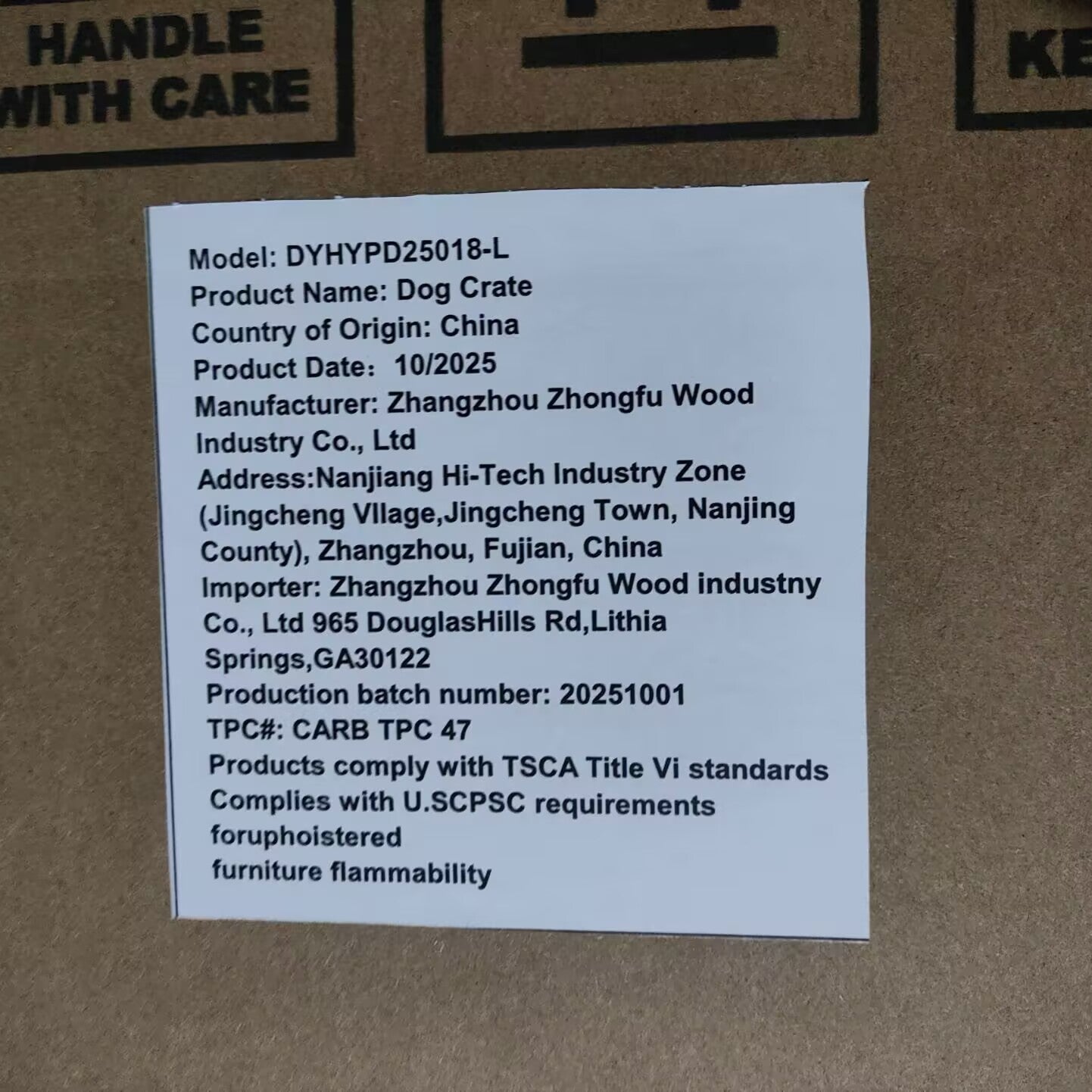 Product label on a cardboard box with text details about the dog crate.
