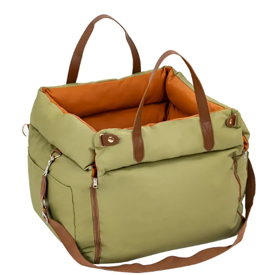 Green bag with brown handles and straps on a white background