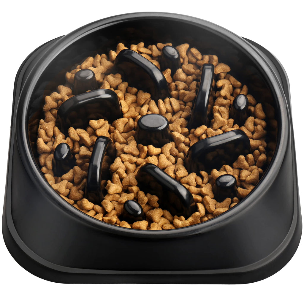 Black pet feeder with dog food on a white background