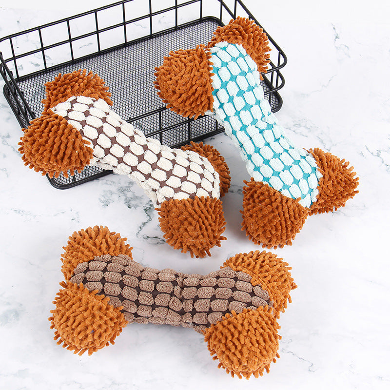 Dog toys with brown and white patterns on a marble surface
