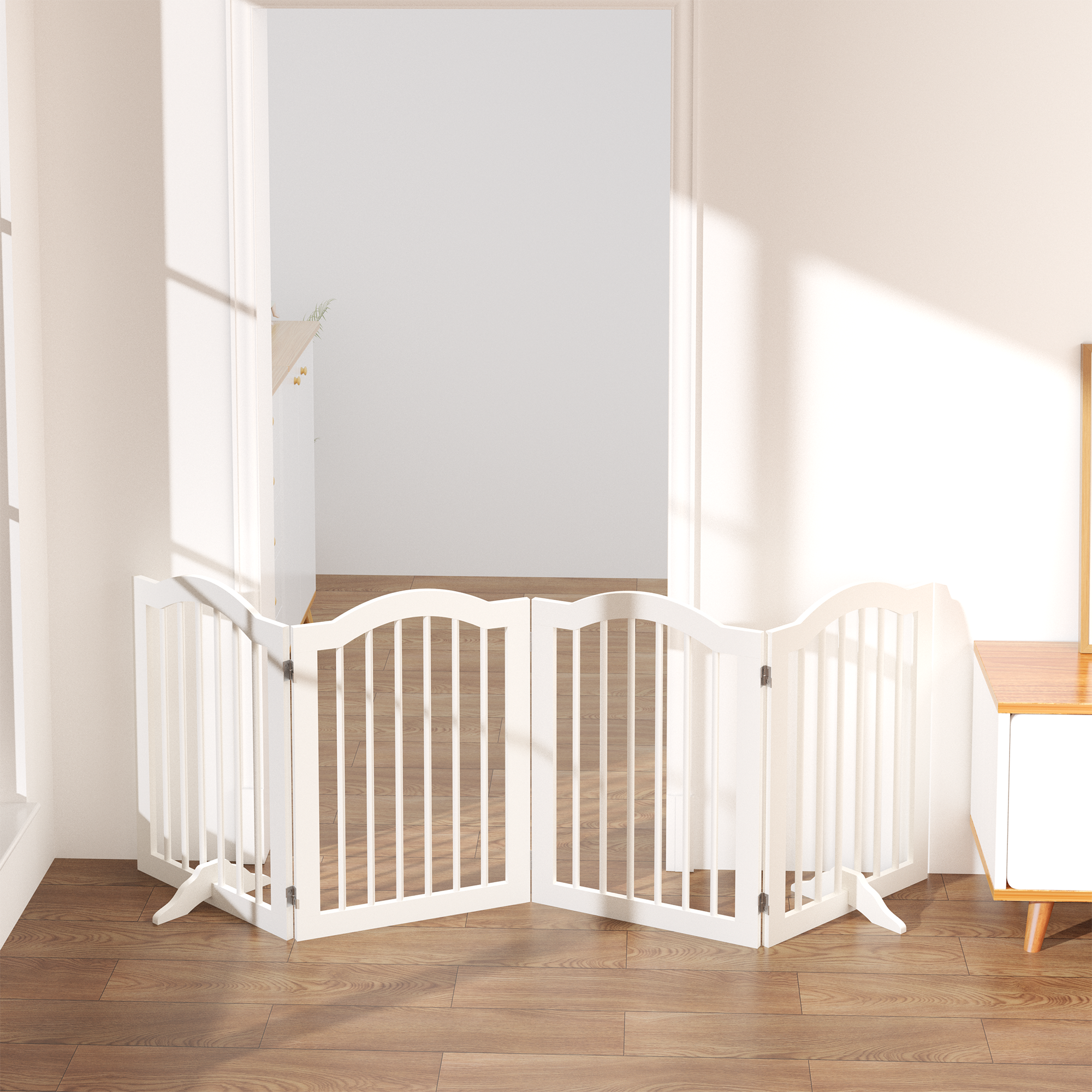White pet gate in a room with wooden flooring and a table.