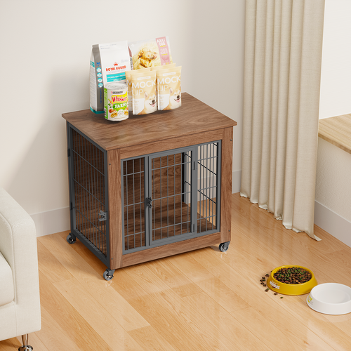 Wooden pet crate with metal bars on a wooden floor, containing pet food bags.