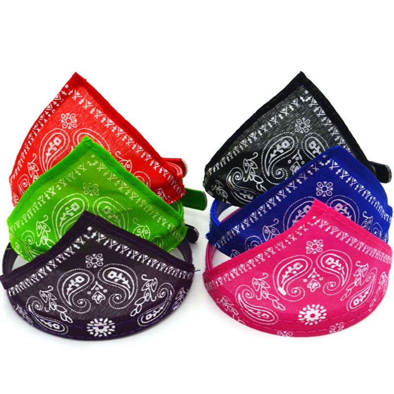 Set of colorful bandana-patterned face masks on a white background