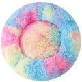 Multicolored fluffy pet bed on a white background