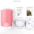 Collection of hair styling tools including a pink roller, white clips, and other accessories on a white background.