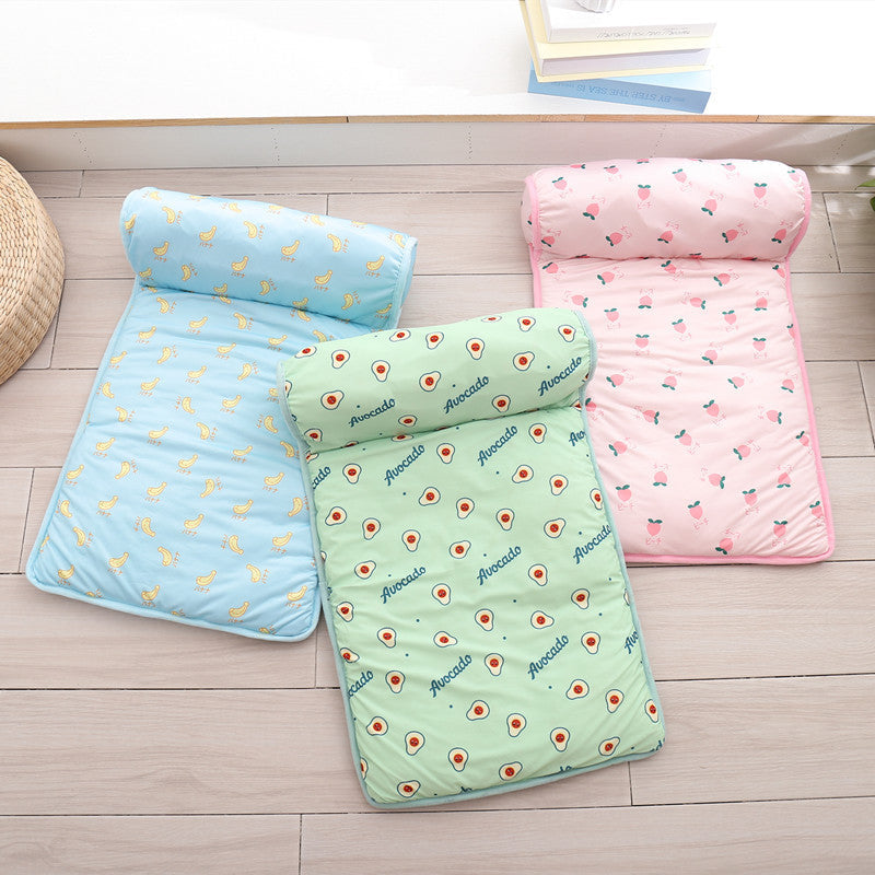 Three colorful sleeping mats with patterns on a wooden floor.
