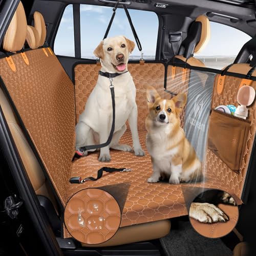 Two dogs on a car seat cover with a clear plastic sheet, likely for rain protection.