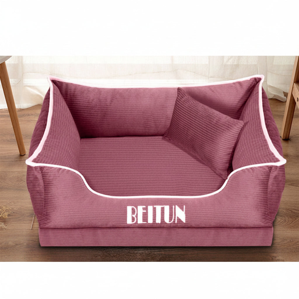 Pink pet bed with white trim and 'BEITUN' branding on a wooden floor.