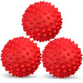 Three red textured balls on a white background