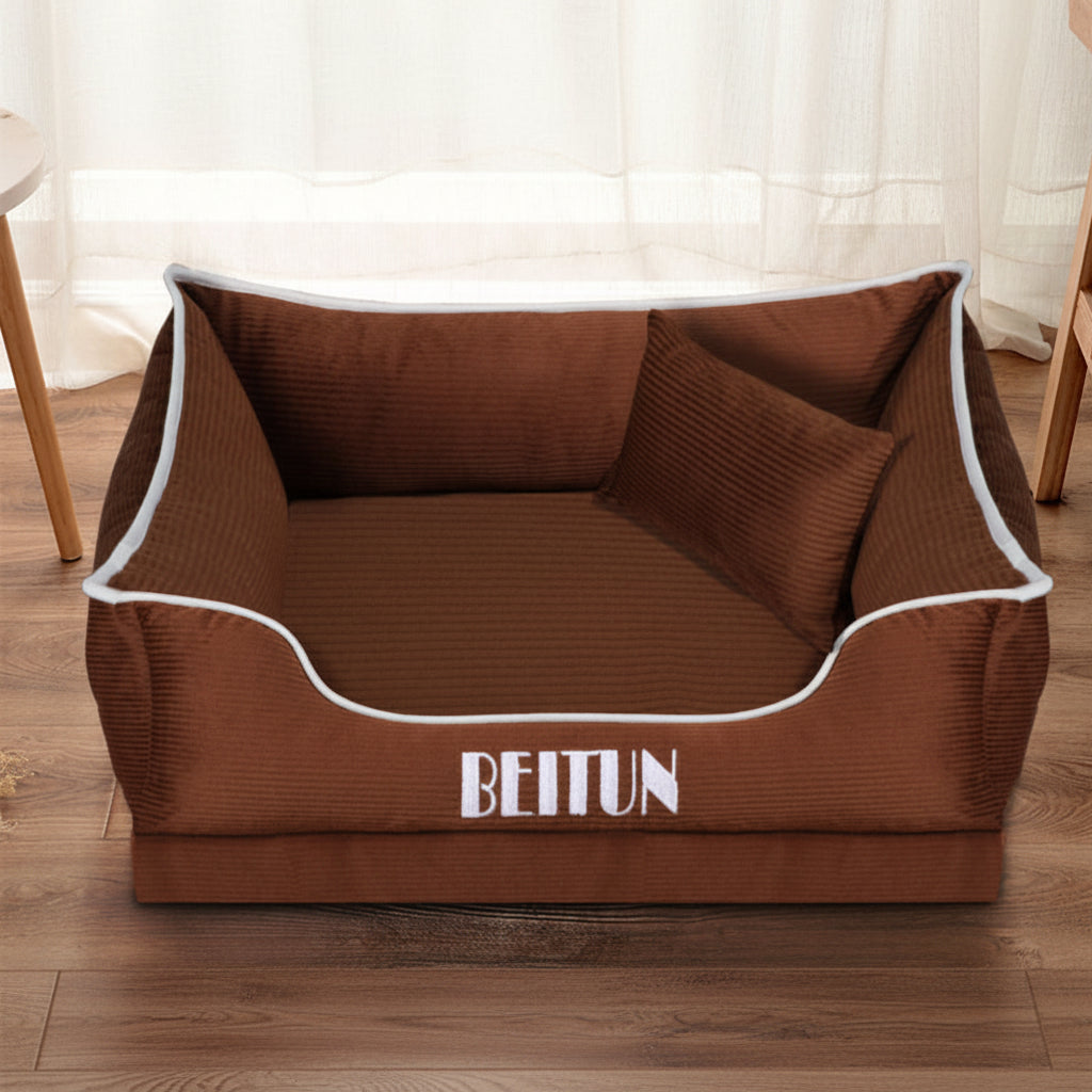 Brown pet bed with white piping and 'BEITUN' branding on a wooden floor.