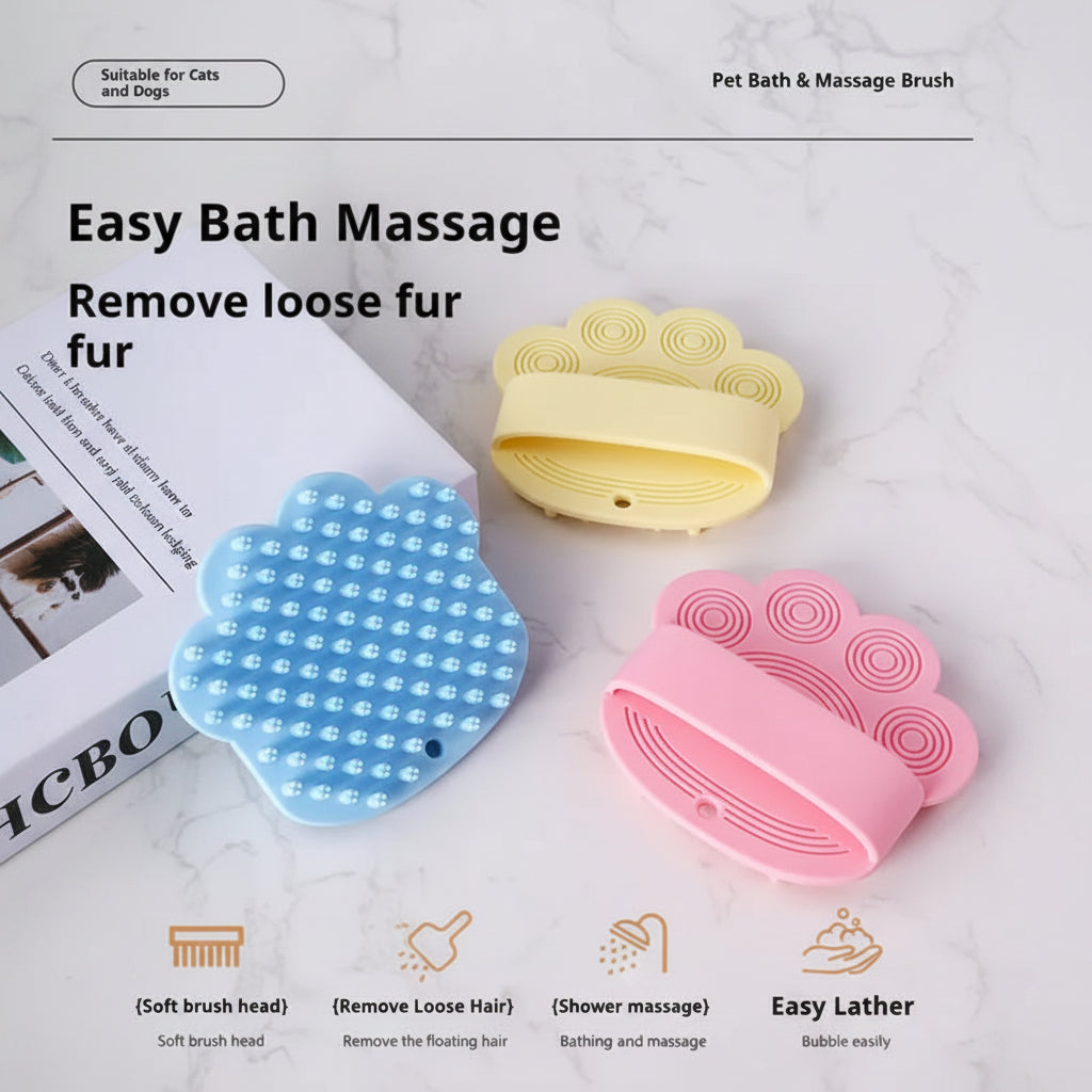 Three pet bath and massage brushes in blue, yellow, and pink on a marble background.