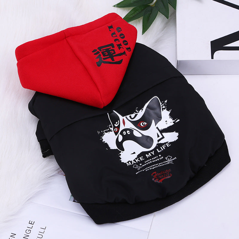 Black hoodie with a dog graphic and red cap on a white background