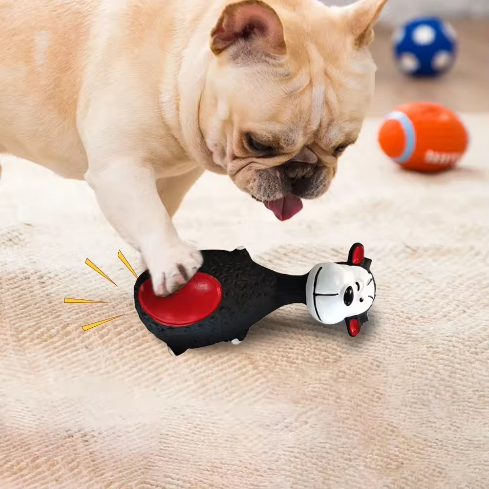 Dog playing with a toy shaped like a cartoon character on a carpeted floor.