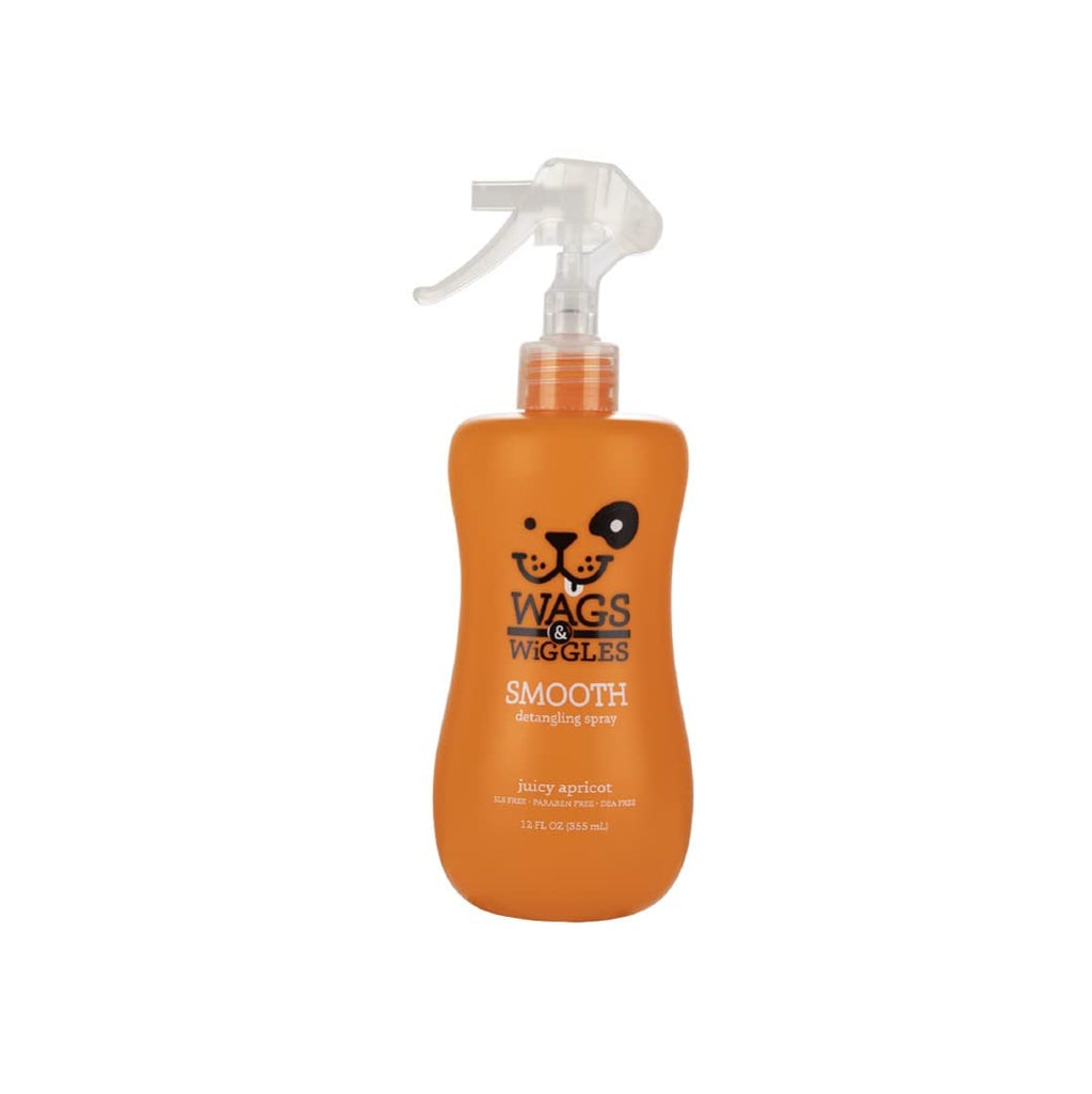 Orange bottle of Wags & Wiggles dog detangling spray on a white background