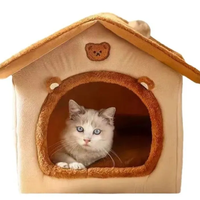 cat in cave pet bed
