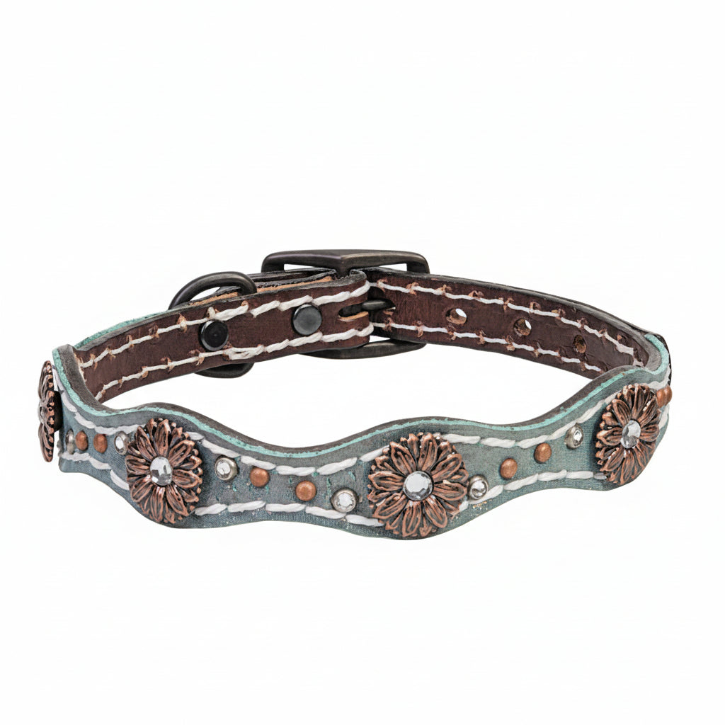 Decorative dog collar with floral patterns and metallic accents on a white background