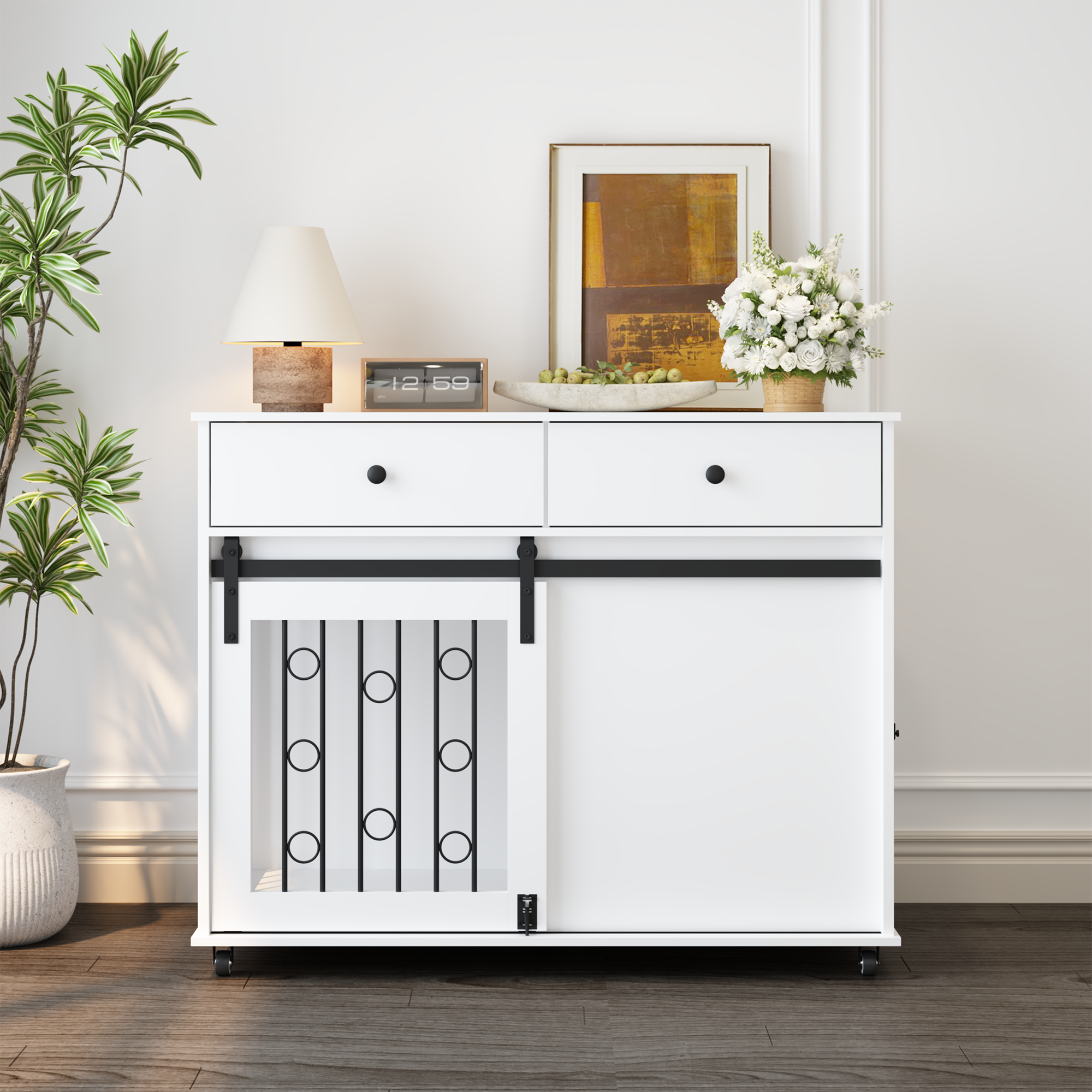 White cabinet with black accents in a room with decor elements like plants and art.
