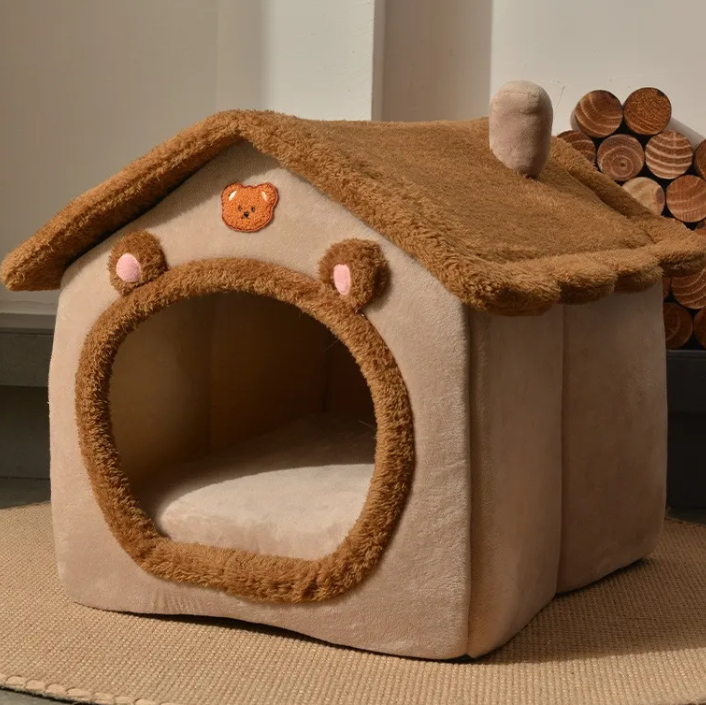 Pet house with teddy bear design on a neutral background