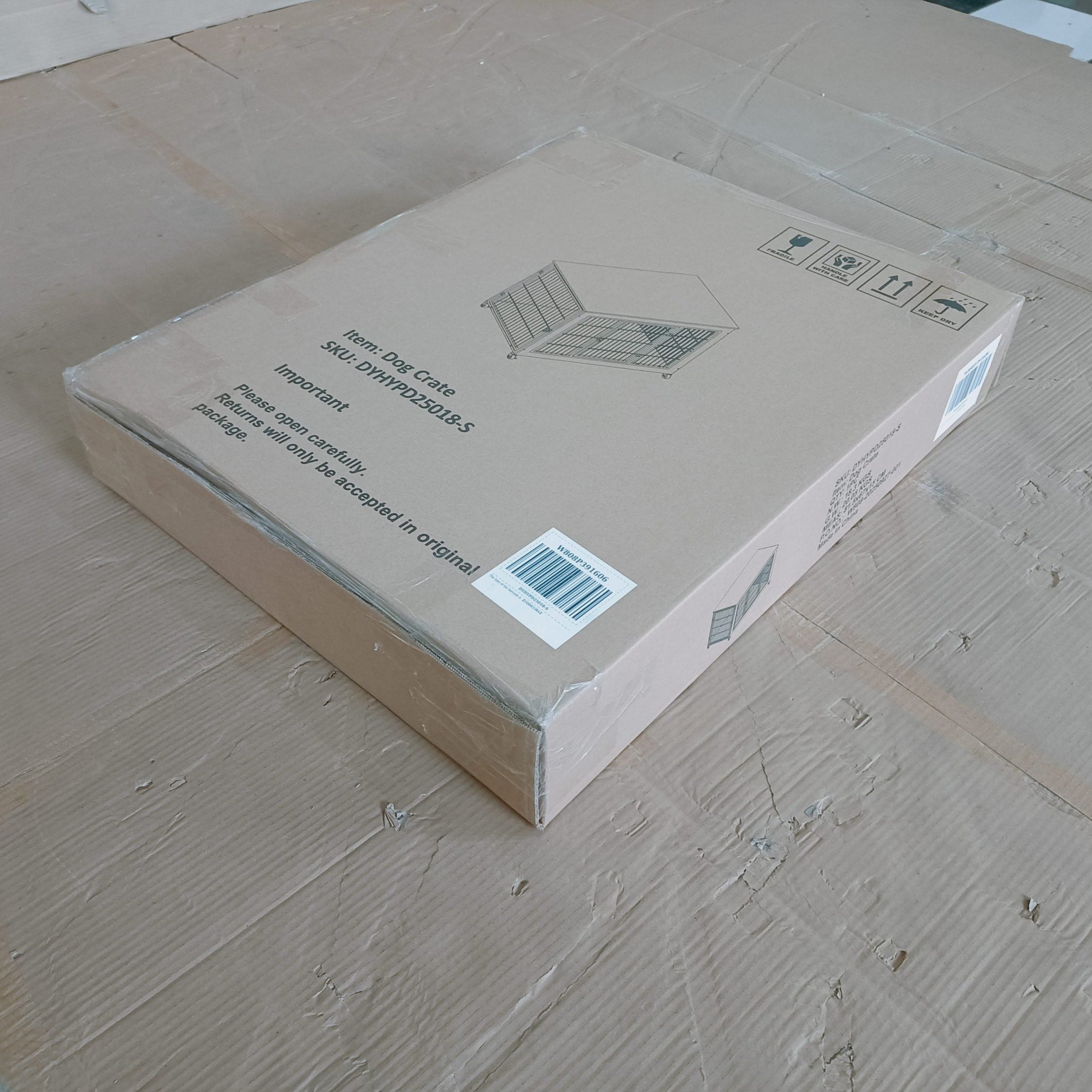 Cardboard box with a barcode on a wooden floor