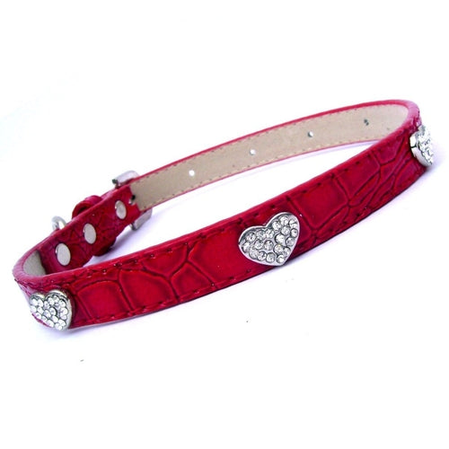 Red textured dog collar with silver heart-shaped buckle on a white background