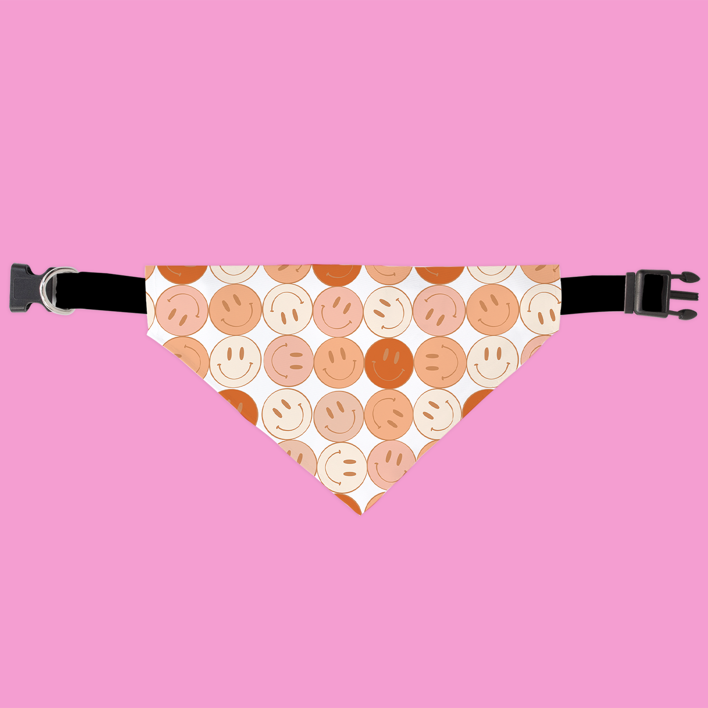 Dog bandana with smiley face pattern on a pink background