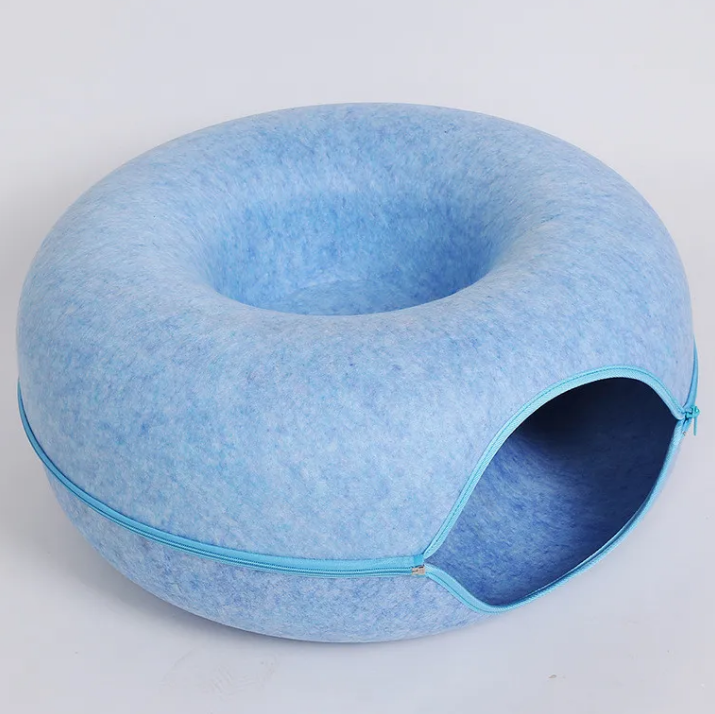 Blue pet bed with a tunnel on a white background
