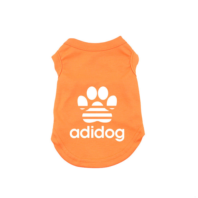 Orange pet shirt with white paw print and 'adidog' text on a white background