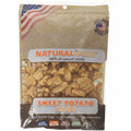 Package of Natural Value Sweet Potato Krisps dog treats with American flag background