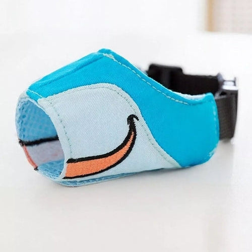 Blue dog harness with a smiley face design on a white background