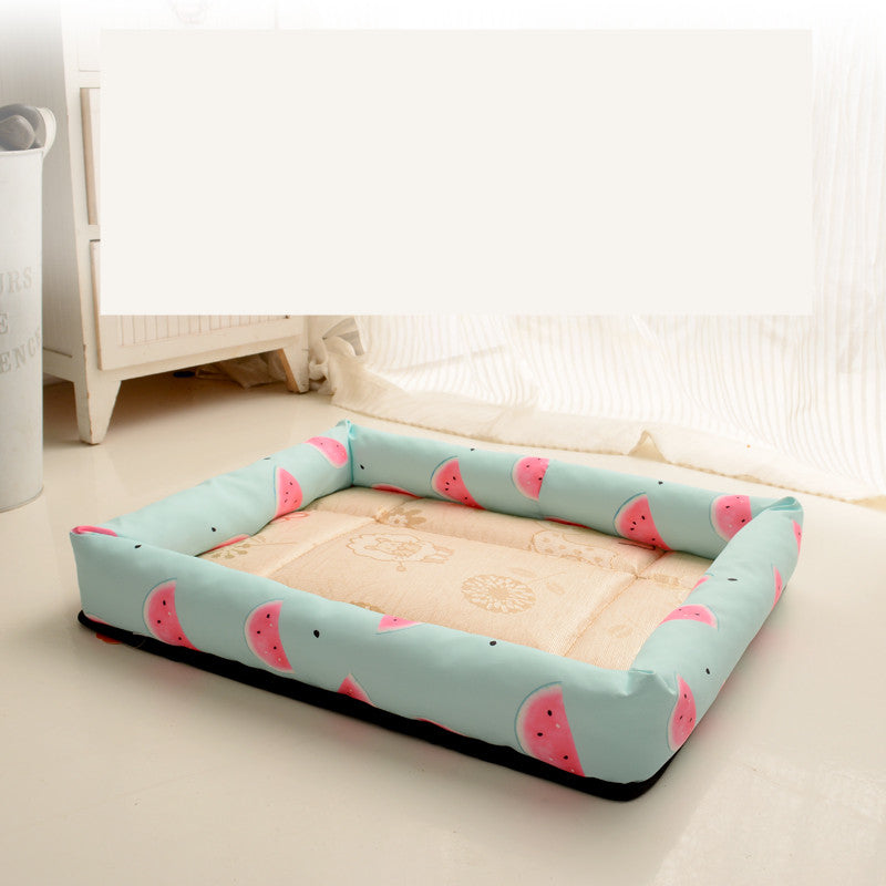 Pet bed with watermelon pattern on a light-colored floor