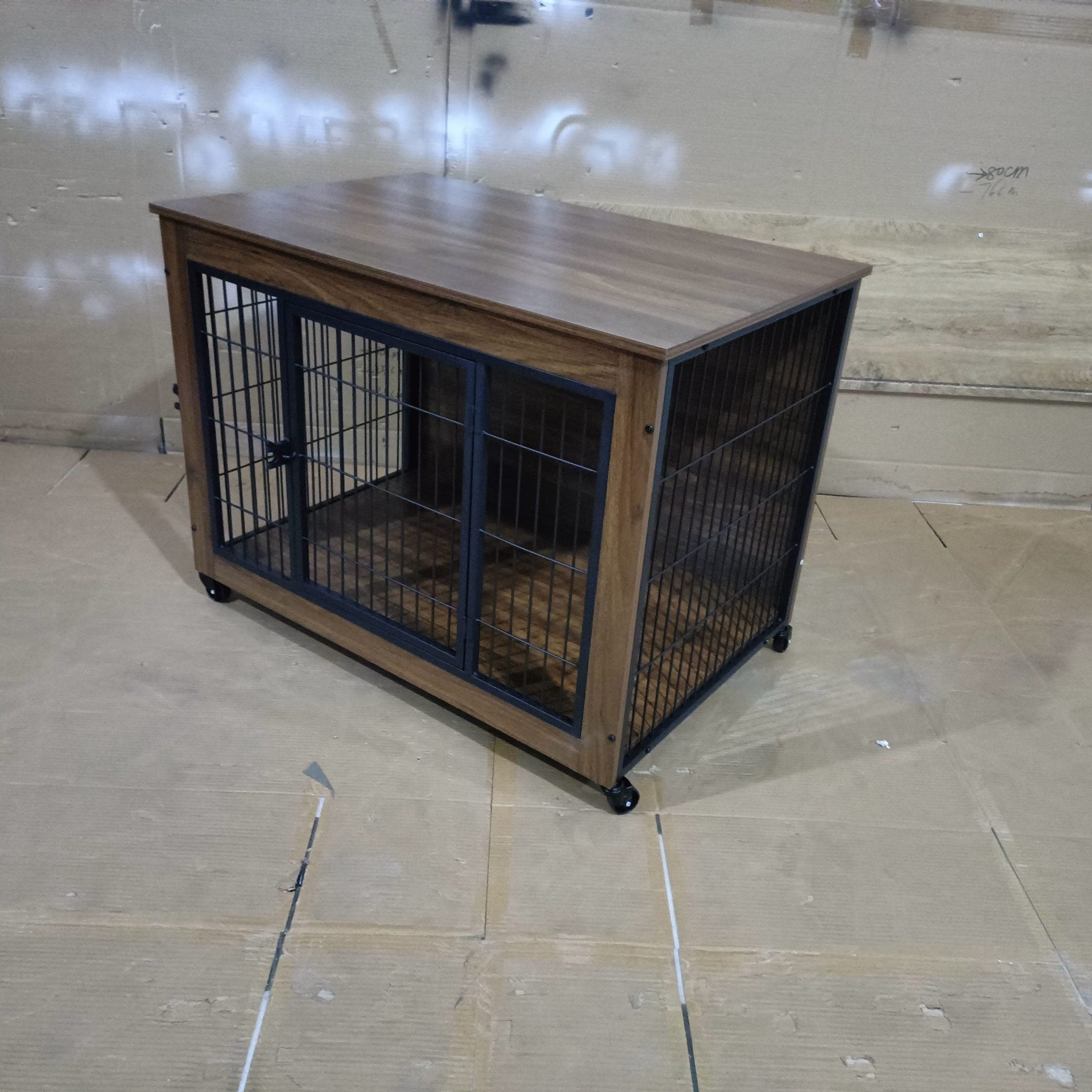 Wooden pet crate with metal bars on a tiled floor