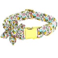 Dog collar with floral and bee pattern on a white background