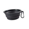 Black collapsible dog bowl with a carabiner on a white background